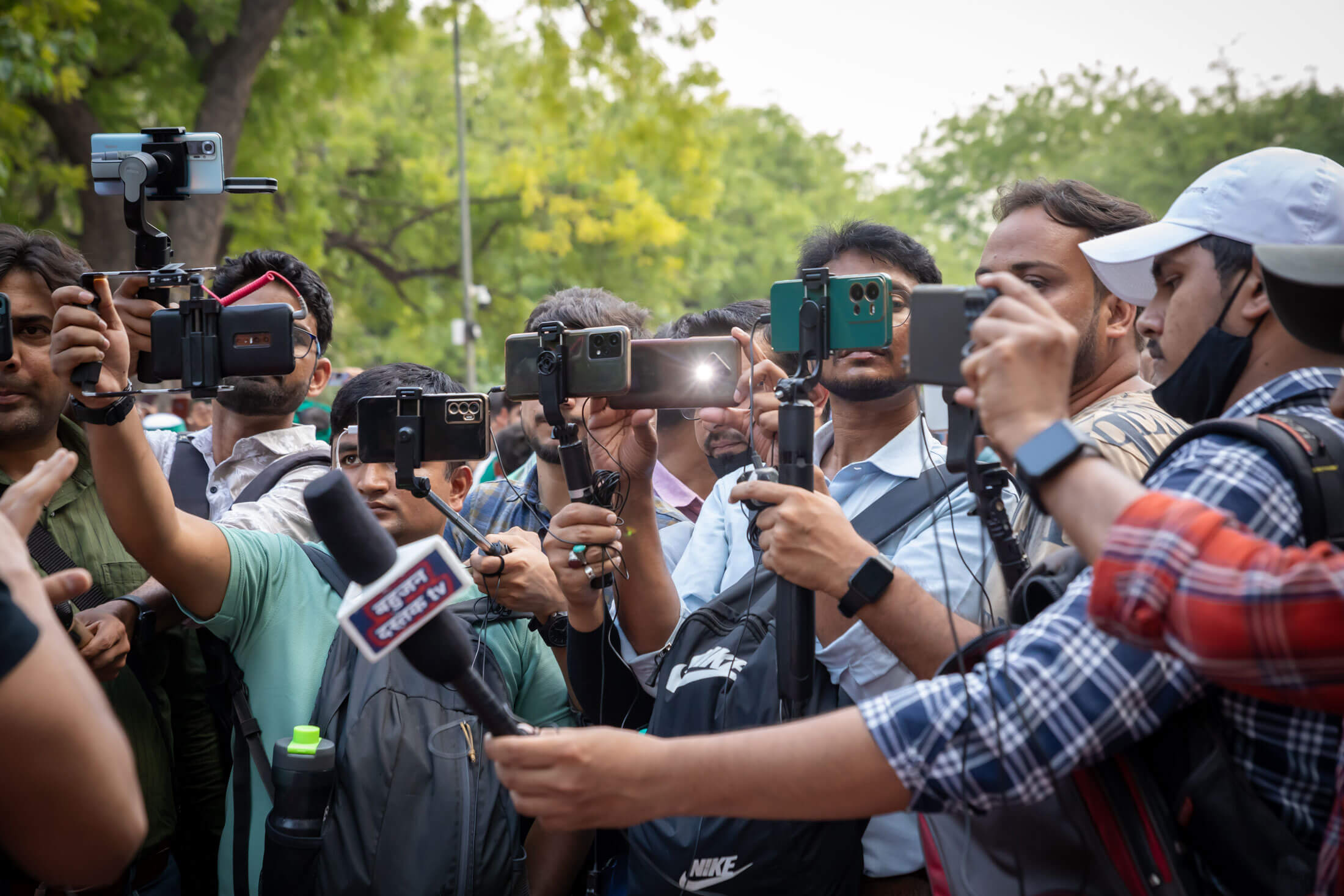 Local news reporting in Delhi, India. Credit: Sunny Rana Photography/Shutterstock
