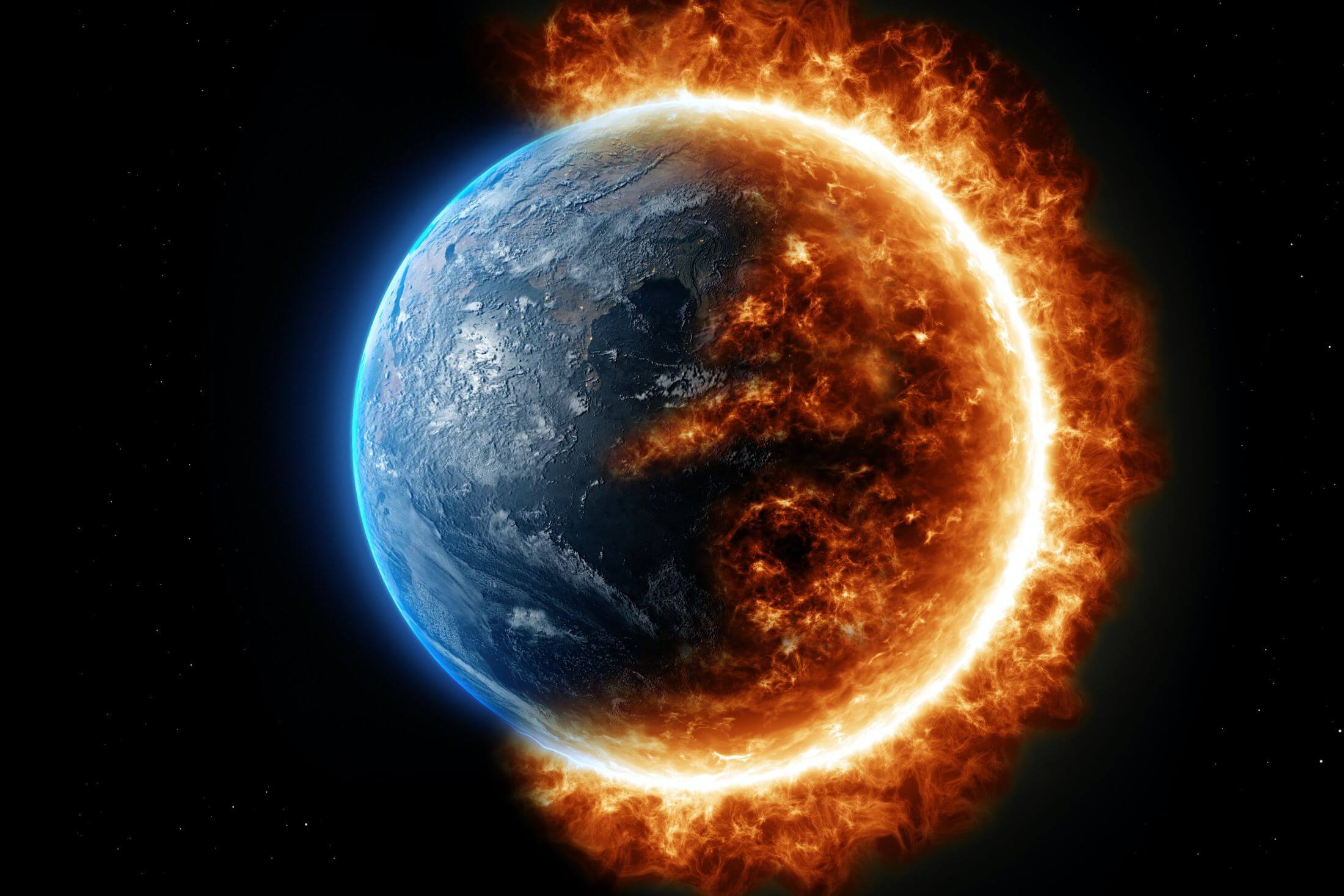 Stylized view of the Earth in space with a third of it in shadow and two-thirds with a ring of fire around it