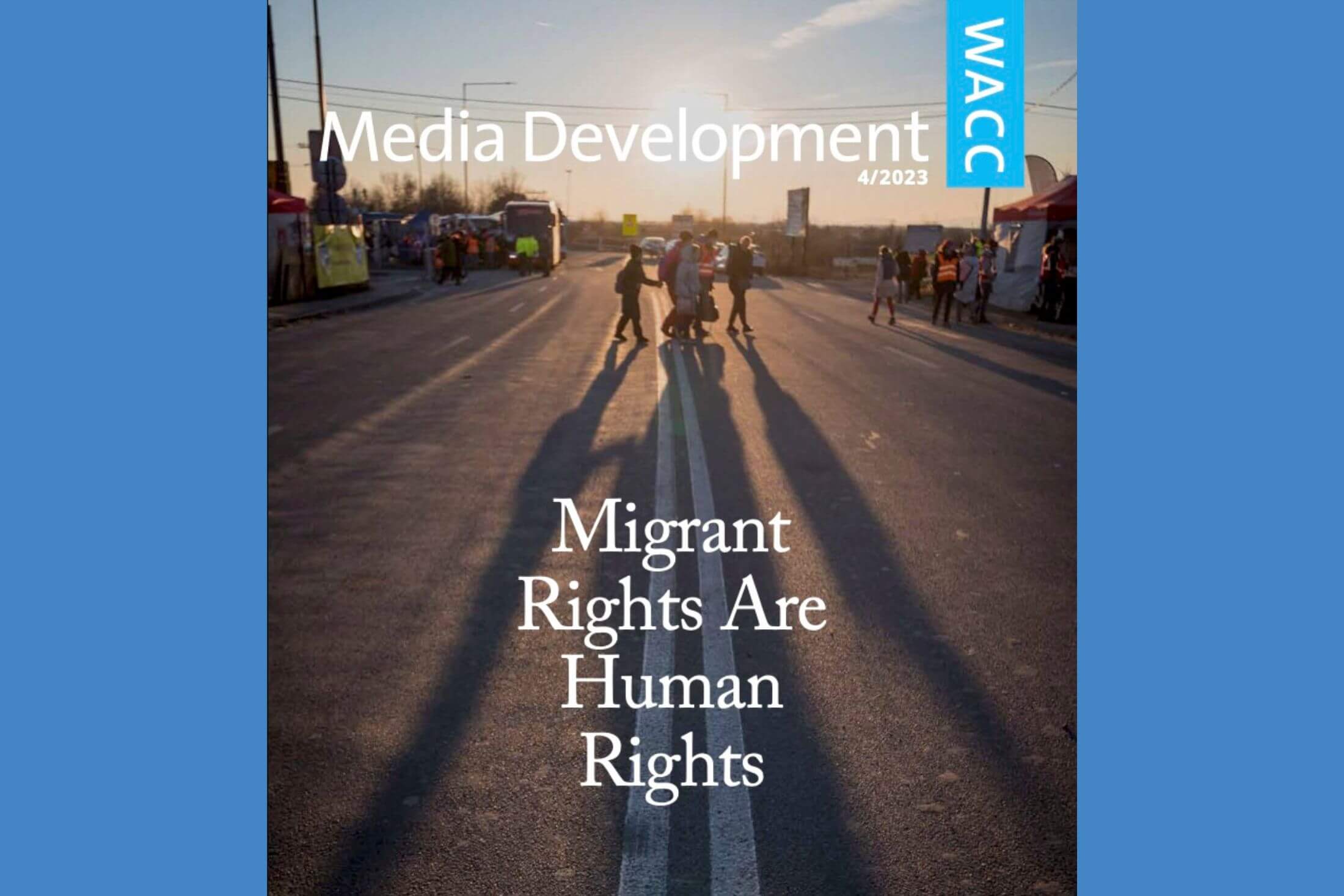 Magazine cover that reads Media Development. Several people with backpacks and bundles on their backs cross a paved road. The sun is rising and casts their shadows onto the road.